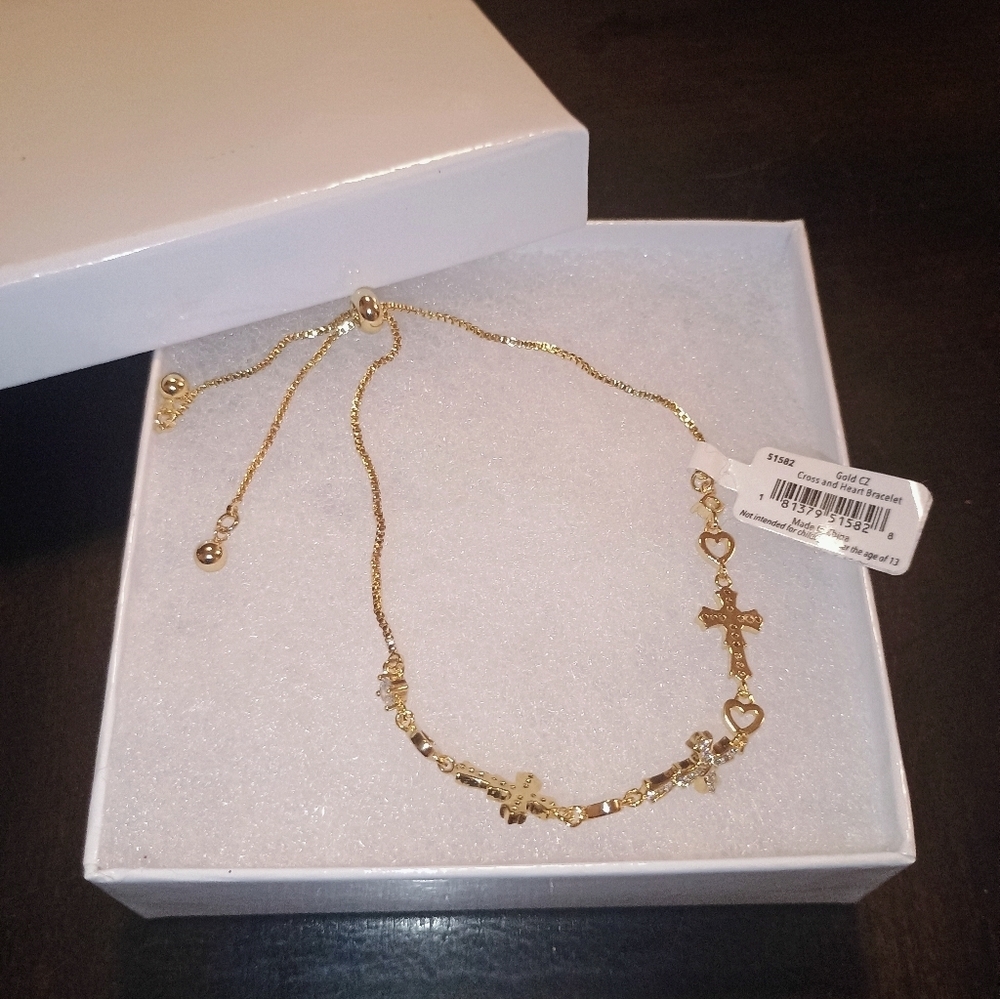Heart and cross adjustable women's bracelet Gold cz . Brand new in box